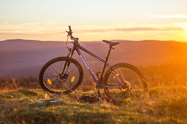 Biking in jura at sunset